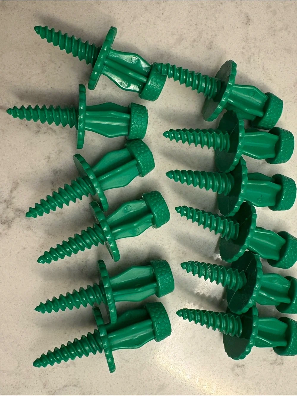 Vintage green screw in corn on the cob holders. Set of 12 for 6 ears